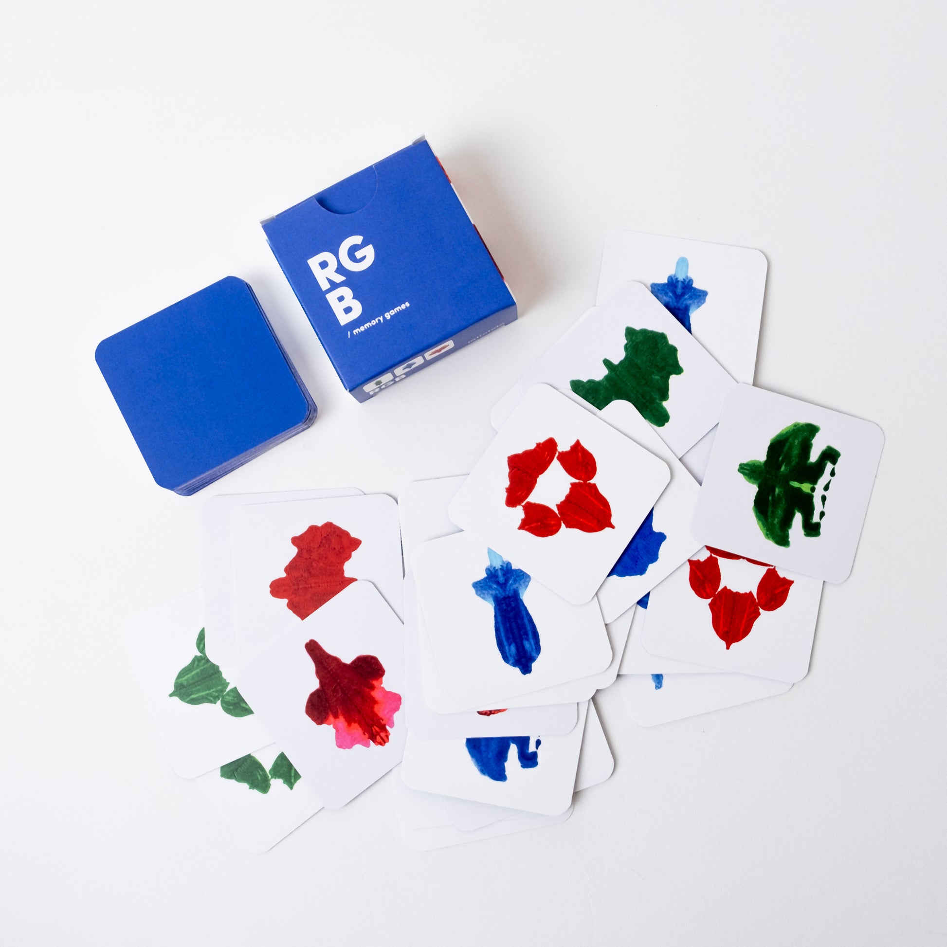 Color mixing cards with red, blue, and green on a white background